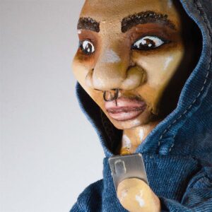 Neil Hughes Puppet Illustration | The Defender